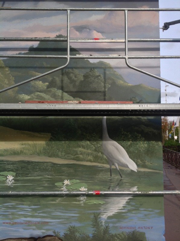 Une aigrette, oiseau d’eau